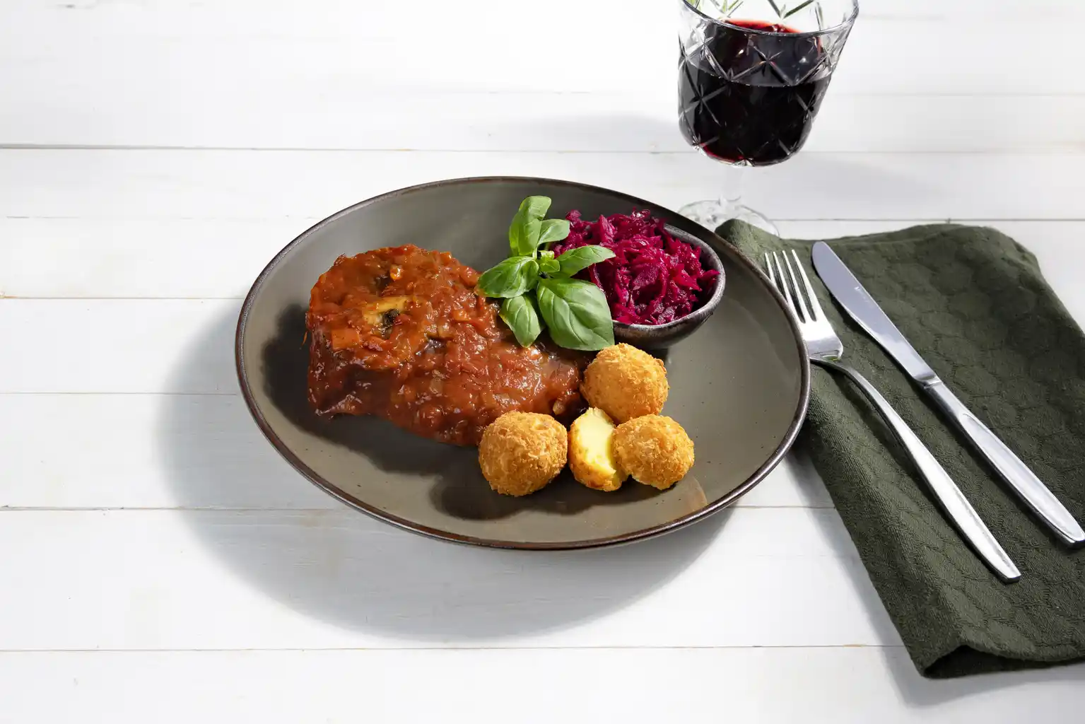 Ossobucco met amandelbollen
